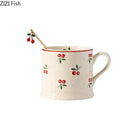 Cream cherry porcelain coffee mug with gold spoon – dining room tableware by Decorbites