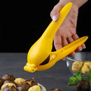 Ergonomic yellow & mint green chestnut clip nutcracker kitchen tool by Decorbites