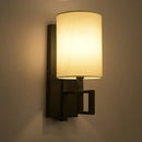 Chinese lantern cloth wall light for bedroom with dark metal sconce by Decorbites