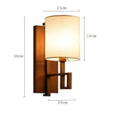Chinese style cloth wall lamp for bedroom with geometric metal frame by Decorbites