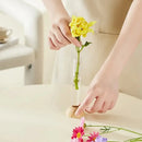 Minimalist wood and plastic test tube vase living room decor