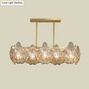 GobekUsa Contemporary Amber Crystal Pendant Light with Brass Island Lighting - 8 Lights, Linear Metal Arm