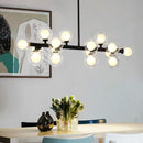 GobekUsa Contemporary Black and Gold Chandelier - White Glass Ball