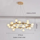 GobekUsa Contemporary Black and Gold Chandelier - White Glass Ball