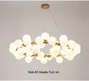 GobekUsa Contemporary Black and Gold Chandelier - White Glass Ball