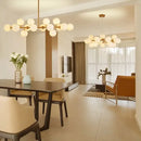 GobekUsa Contemporary Black and Gold Chandelier - White Glass Ball