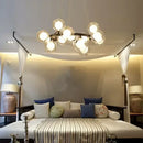 GobekUsa Contemporary Black and Gold Chandelier - White Glass Ball
