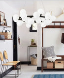 GobekUsa Contemporary Black and Gold Chandelier - White Glass Ball