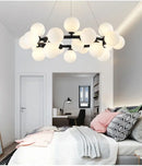 GobekUsa Contemporary Black and Gold Chandelier - White Glass Ball