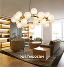 GobekUsa Contemporary Black and Gold Chandelier - White Glass Ball