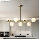 GobekUsa Contemporary Brass Pendant Lamp with 7-Light White Glass, Ideal for Living Room Illumination