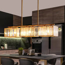 GobekUsa Contemporary Gold Pendant Lighting for Dining Room - Metal Linear Island Lamp with Clear Cuboid Crystal Shade