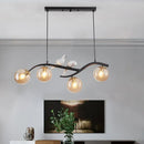GobekUsa Contemporary Metal Branch Hanging Lamp Island Pendant - 4-Light Black/Gold with Bird Deco and Smoke Grey/Cognac Glass Shade