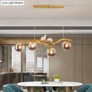 GobekUsa Contemporary Metal Branch Hanging Lamp Island Pendant - 4-Light Black/Gold with Bird Deco and Smoke Grey/Cognac Glass Shade