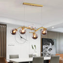 GobekUsa Contemporary Metal Branch Hanging Lamp Island Pendant - 4-Light Black/Gold with Bird Deco and Smoke Grey/Cognac Glass Shade