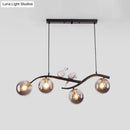 GobekUsa Contemporary Metal Branch Hanging Lamp Island Pendant - 4-Light Black/Gold with Bird Deco and Smoke Grey/Cognac Glass Shade