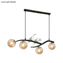 GobekUsa Contemporary Metal Branch Hanging Lamp Island Pendant - 4-Light Black/Gold with Bird Deco and Smoke Grey/Cognac Glass Shade