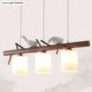 GobekUsa Contemporary Wood Island Pendant with Nutcracker Design and Cylindrical Glass Shades - Set of 3 Lights