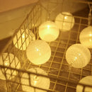 Pastel crackled spherical cotton garland led string lights bedroom by Decorbites