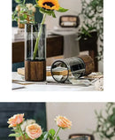 Creative retro glass vase with wood base for living room by Decorbites