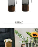 Creative retro glass vase with wood base for living room by Decorbites
