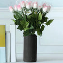 Creative striped black plastic flower vase for living room floral arrangements by Decorbites
