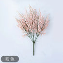 Mint green ceramic vase with yellow lemon grass branch living room by Decorbites