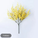 Mint green ceramic vase with yellow lemon grass branch living room by Decorbites