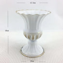 Ornate white & gold metal flower vase – dining room centerpiece by Decorbites