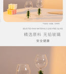 Festive green christmas wine glasses with tree stem dining room decor by Decorbites