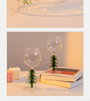Festive green christmas wine glasses with tree stem dining room decor by Decorbites