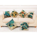 Teal and gold ginkgo leaves linen cushion cover living room by Decorbites