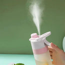 Light green & white tritan spray water bottle for outdoor sports by Decorbites