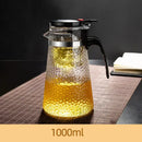 Hammered textured glass tea maker kitchen teapot with black handle by Decorbites