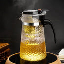 Hammered textured glass tea maker kitchen teapot with black handle by Decorbites