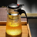 Hammered textured glass tea maker kitchen teapot with black handle by Decorbites