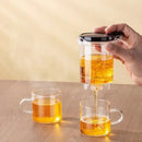 Modern glass tea brewing infuser kitchen teapot with black accents by Decorbites