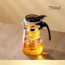 Modern glass tea brewing infuser kitchen teapot with black accents by Decorbites