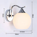 Modern chrome glass wall lamp for bedroom with frosted white shade by Decorbites