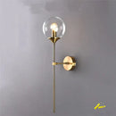 Modern brass and smoked glass wall lamp bedroom sconce by Decorbites