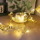 Golden silver tiny leaves fairy lights bedroom decor by Decorbites