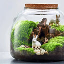 Green moss glass vase terrarium with rabbit figurines living room decor by Decorbites