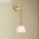 GobekUsa Industrial Brass Sconce with Clear Textured Glass Dome - One Light Lighting Fixture