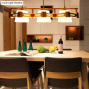 GobekUsa Japanese Hanging Light: Trapezoid Cream Glass, 3-Bulb Pendant for Dining Room or Kitchen Island, Wood Base