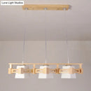 GobekUsa Japanese Hanging Light: Trapezoid Cream Glass, 3-Bulb Pendant for Dining Room or Kitchen Island, Wood Base