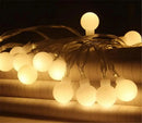 Warm frosted white led globe ball string lights bedroom decor by Decorbites
