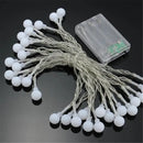 Warm frosted white led globe ball string lights bedroom decor by Decorbites