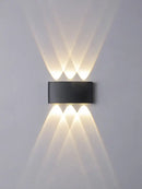 Modern black geometric led wall lamp for living room by Decorbites