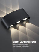 Modern black geometric led wall lamp for living room by Decorbites