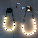 GobekUsa LED Necklace Wall Lights: Gold Black Metal White Acrylic Sconce for Home Art Deco